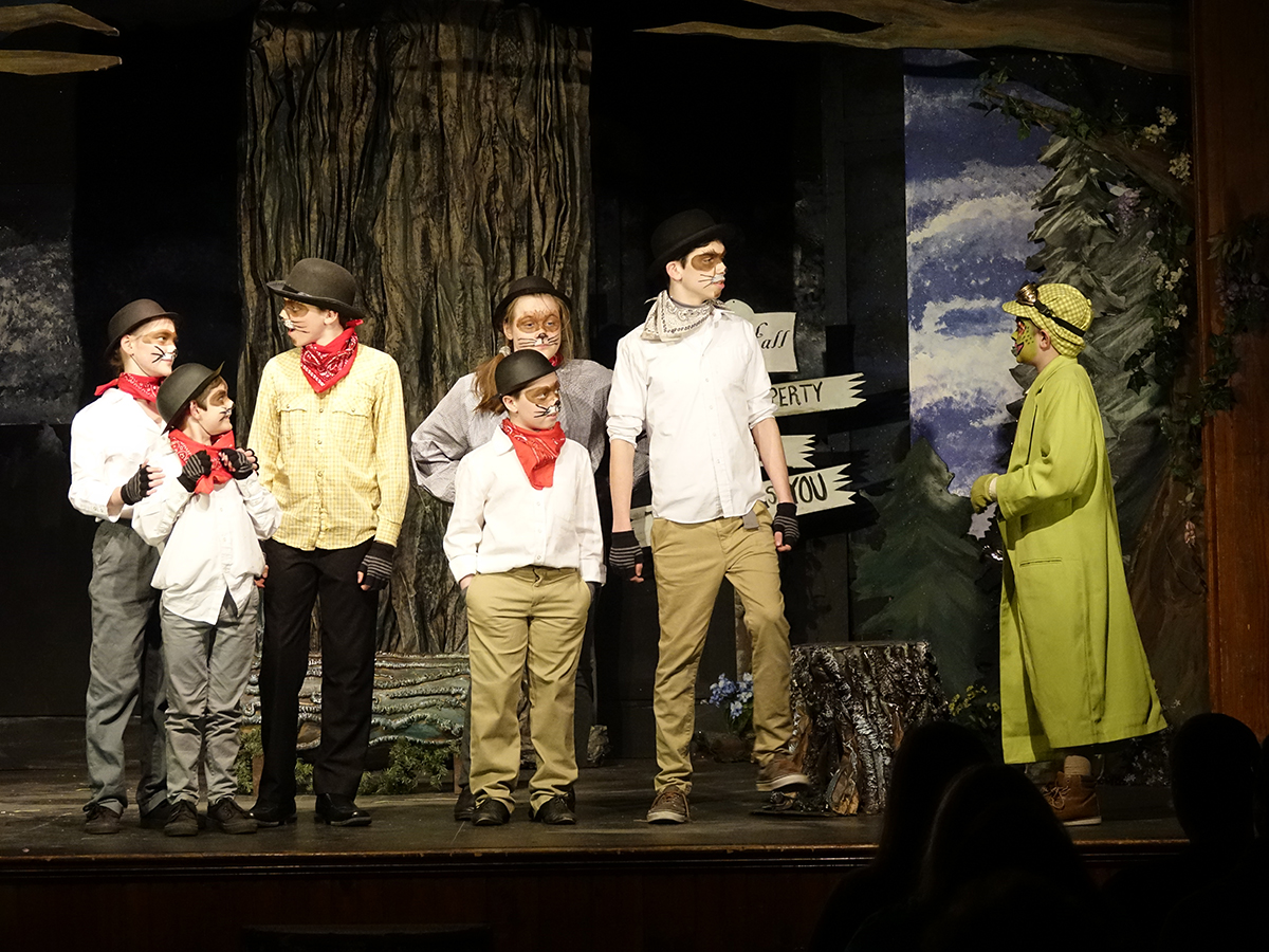 Mr. Toad confronts the Weasel family