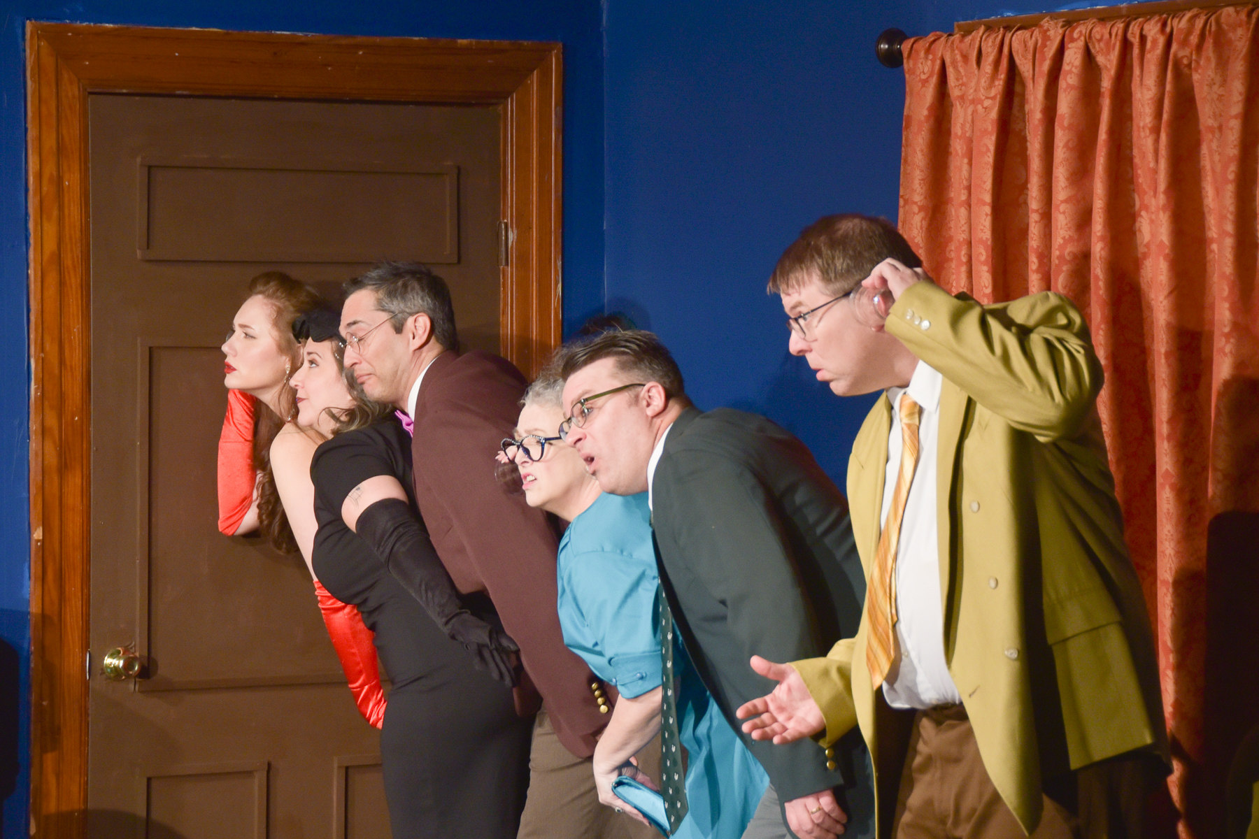 The guests listen at the door